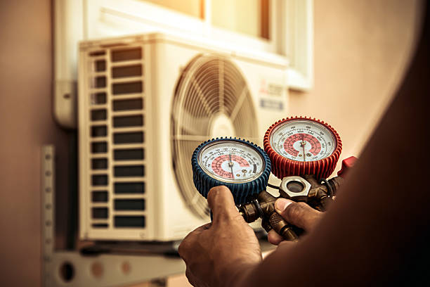 Professional Air Conditioning Service technician working in Hamburg, AR